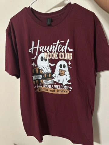Maroon t-shirt with 'Haunted Book Club' graphic design on a white background